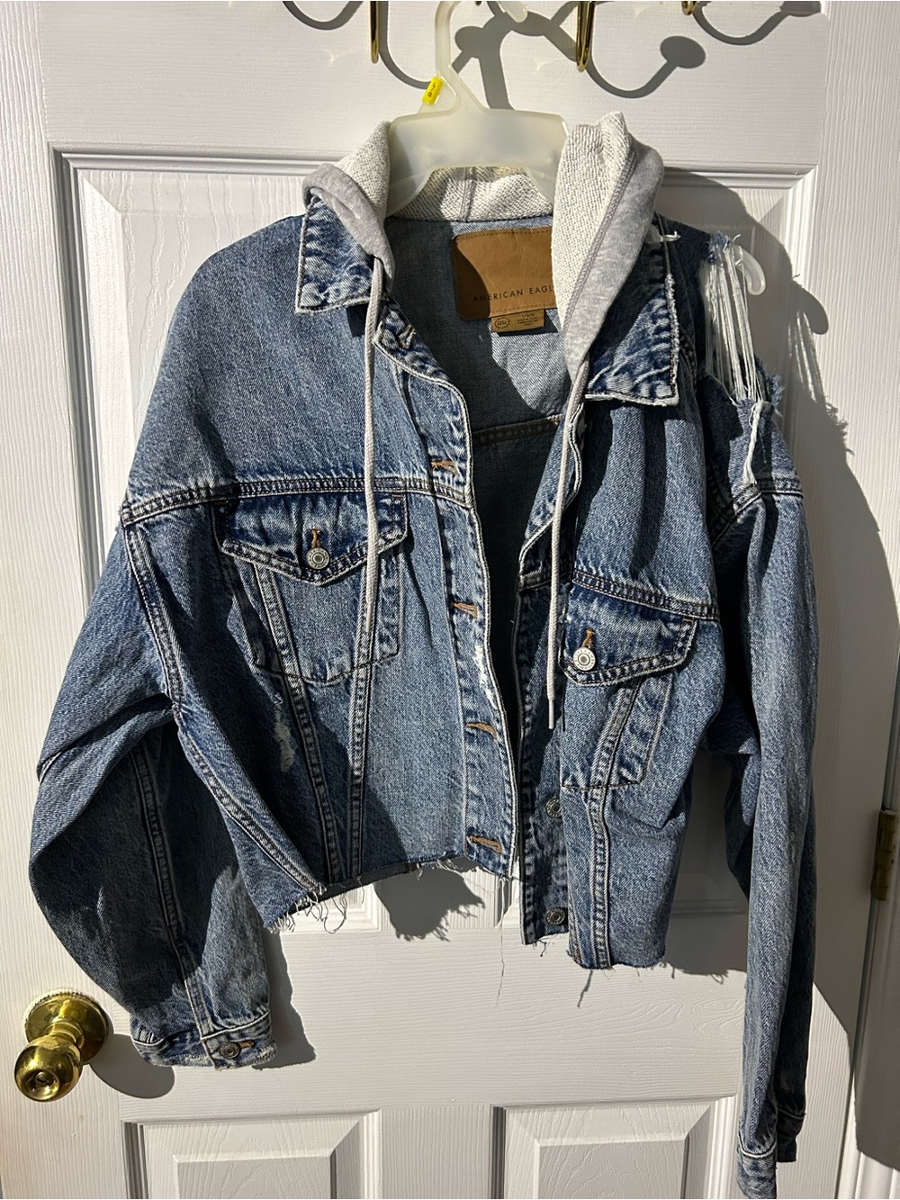 American Eagle Outfitters Distressed Blue Denim Jacket with Gray Hood